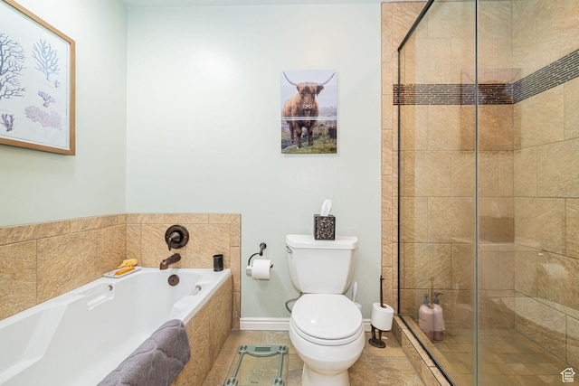 2406 Woodland Dr, Ogden, UT 84403 - bathroom featuring baseboards, tile patterned floors, toilet, a shower stall, and a bath