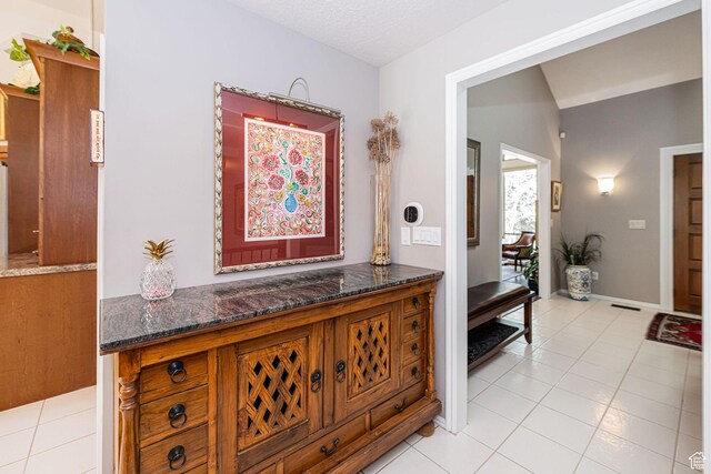 2406 Woodland Dr, Ogden, UT 84403 - hall with visible vents and light tile patterned flooring
