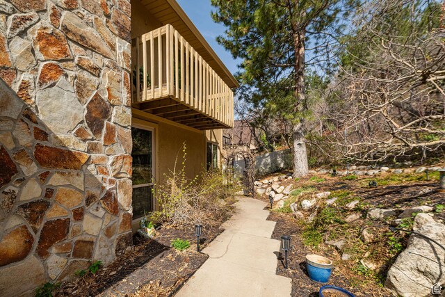 2406 Woodland Dr, Ogden, UT 84403 - view of yard featuring a balcony and fence