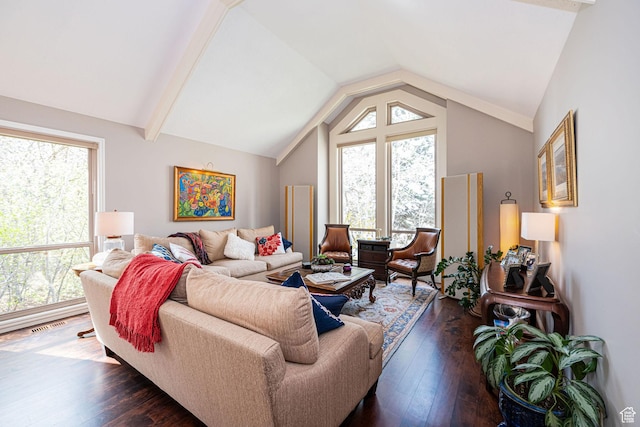 2406 Woodland Dr, Ogden, UT 84403 - living area with a healthy amount of sunlight, dark wood finished floors, and vaulted ceiling