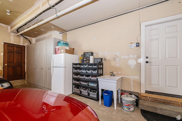2406 Woodland Dr, Ogden, UT 84403 - garage with freestanding refrigerator