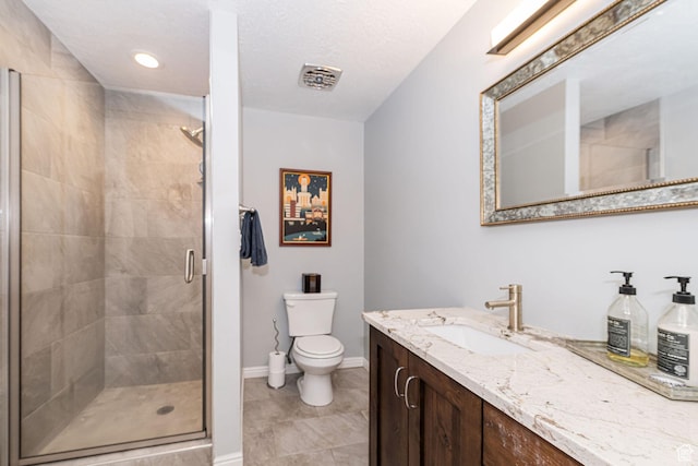 2406 Woodland Dr, Ogden, UT 84403 - bathroom featuring toilet, vanity, baseboards, and a stall shower