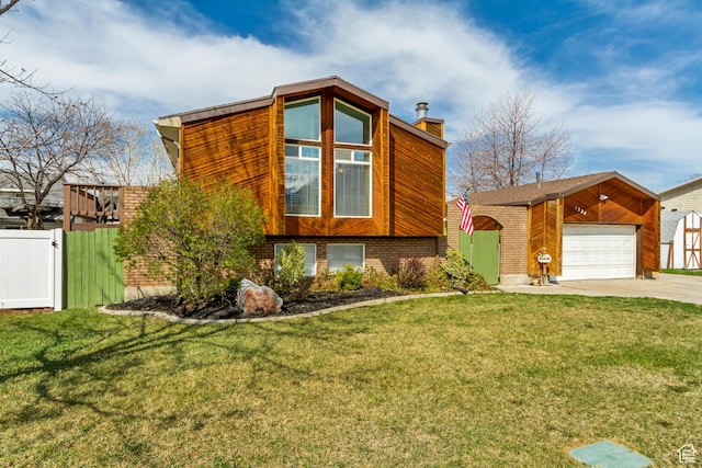 1224 S 760 W, Provo, UT 84601 - view of front facade with a gate, a front lawn, brick siding, a garage, and fence