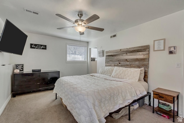 1224 S 760 W, Provo, UT 84601 - bedroom featuring light colored carpet, ceiling fan, and visible vents