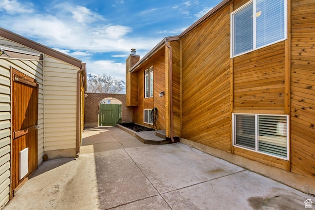 1224 S 760 W, Provo, UT 84601 - view of side of property with a patio and a chimney