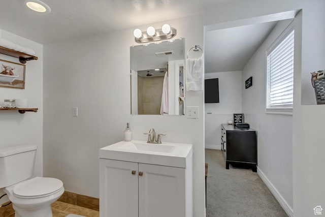 1224 S 760 W, Provo, UT 84601 - bathroom featuring vanity, visible vents, baseboards, and toilet