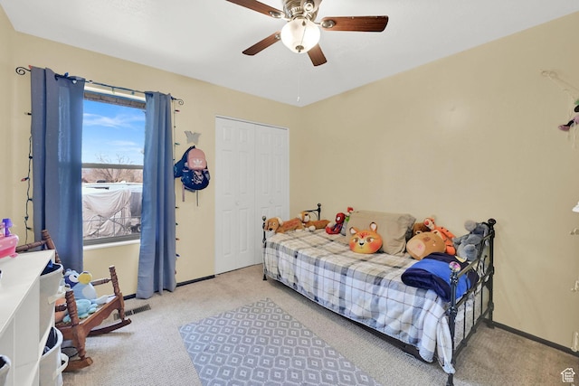 992 E 5625 S, South Ogden, UT 84405 - carpeted bedroom featuring a closet, baseboards, and a ceiling fan