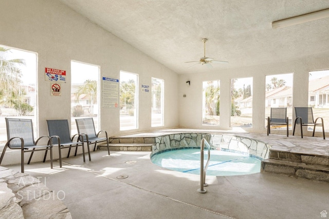 145 S Crystal Lakes Dr Unit 80, St George, UT 84770 - view of swimming pool with ceiling fan, a swimming pool, and a hot tub
