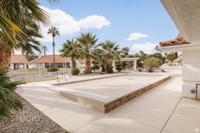145 S Crystal Lakes Dr Unit 80, St George, UT 84770 - view of patio / terrace featuring a game area