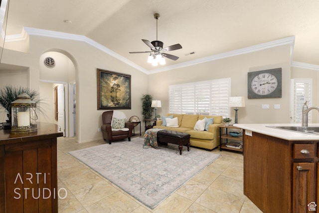 145 S Crystal Lakes Dr Unit 80, St George, UT 84770 - living area with arched walkways, a ceiling fan, ornamental molding, visible vents, and lofted ceiling