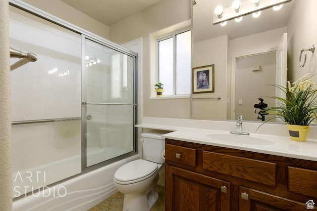 145 S Crystal Lakes Dr Unit 80, St George, UT 84770 - full bathroom featuring toilet, vanity, and combined bath / shower with glass door