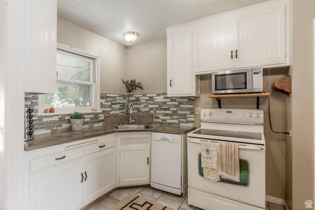 1240 E 520 S, Provo, UT 84606 - kitchen with white appliances, a sink, tasteful backsplash, and white cabinetry