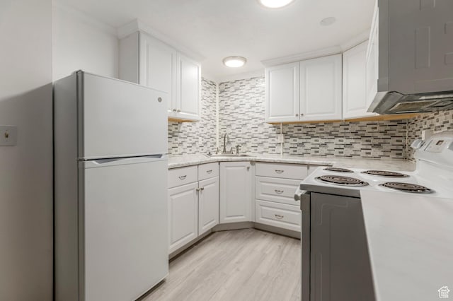 1240 E 520 S, Provo, UT 84606 - kitchen with white appliances, a sink, white cabinets, backsplash, and light wood-style flooring