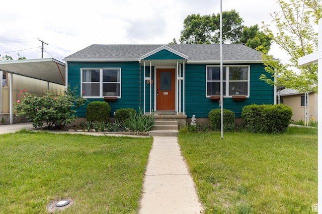 1240 E 520 S, Provo, UT 84606 - view of front facade with a front lawn and roof with shingles