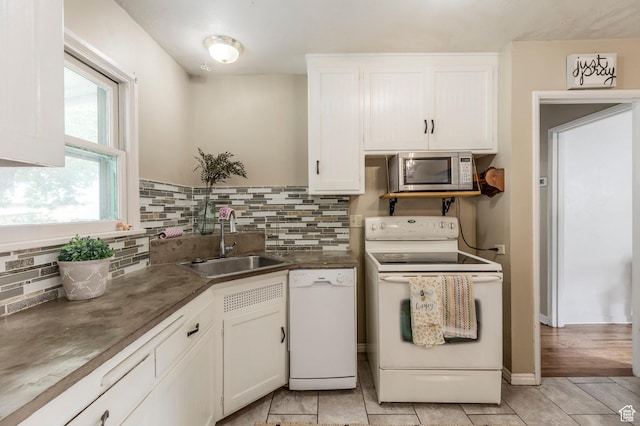1240 E 520 S, Provo, UT 84606 - kitchen with white appliances, a sink, white cabinetry, decorative backsplash, and light tile patterned floors