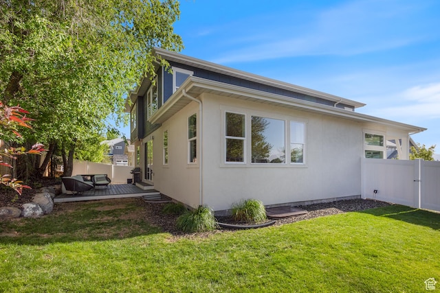 11779 S Windcroft Ct E, Sandy, UT 84092 - view of side of home featuring a wooden deck and stucco siding