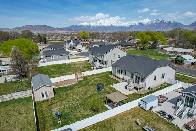 aerial view with a mountain view and a residential view