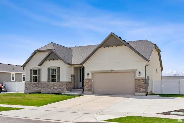 view of front of property with an attached garage, a gate, driveway, and stucco siding