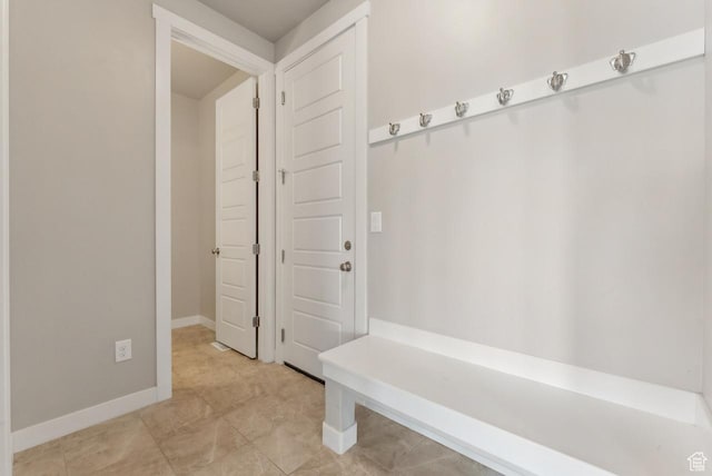 mudroom featuring baseboards