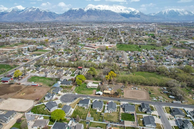 aerial view featuring a mountain view and a residential view