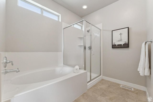 bathroom featuring a shower stall, a bath, visible vents, recessed lighting, and baseboards
