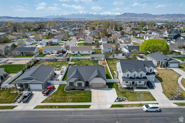 aerial view featuring a residential view and a mountain view