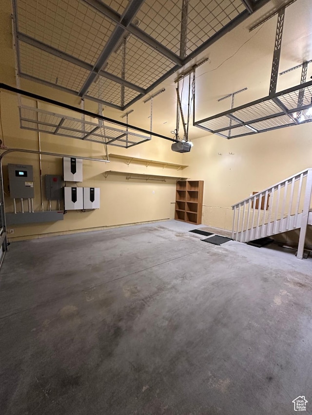 32 Belmore Dr, Kaysville, UT 84037 - garage with electric panel and a garage door opener
