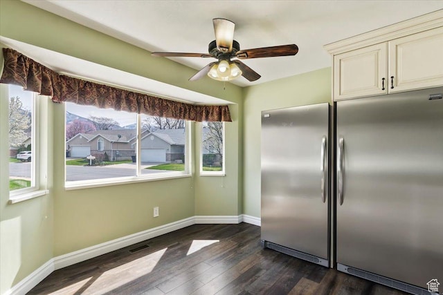 32 Belmore Dr, Kaysville, UT 84037 - kitchen with dark wood-type flooring, baseboards, cream cabinets, and stainless steel built in refrigerator