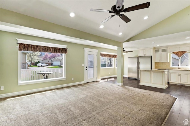 32 Belmore Dr, Kaysville, UT 84037 - unfurnished living room with recessed lighting, a ceiling fan, vaulted ceiling, and baseboards