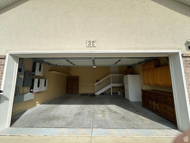 32 Belmore Dr, Kaysville, UT 84037 - garage featuring freestanding refrigerator