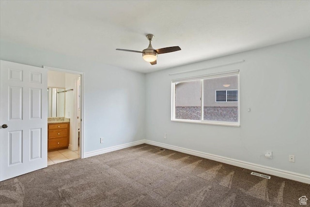 32 Belmore Dr, Kaysville, UT 84037 - unfurnished bedroom with light carpet, baseboards, visible vents, and connected bathroom