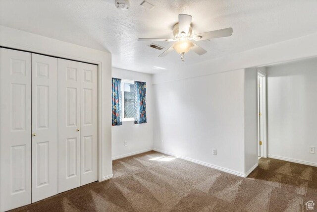 32 Belmore Dr, Kaysville, UT 84037 - unfurnished bedroom featuring visible vents, a closet, a textured ceiling, and carpet floors
