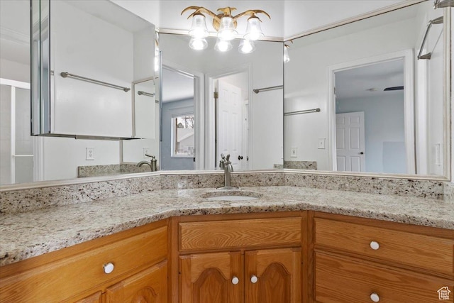 32 Belmore Dr, Kaysville, UT 84037 - bathroom featuring a chandelier and vanity