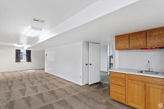 32 Belmore Dr, Kaysville, UT 84037 - interior space featuring a sink, visible vents, baseboards, and light colored carpet
