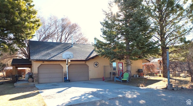 263 W 300 S, Parowan, UT 84761 - view of front of property with a garage, stucco siding, concrete driveway, and stone siding