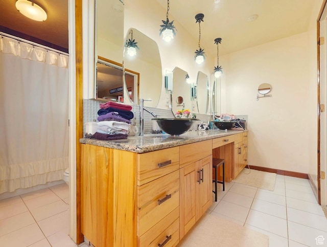 263 W 300 S, Parowan, UT 84761 - bathroom with vanity, tile patterned flooring, baseboards, and toilet