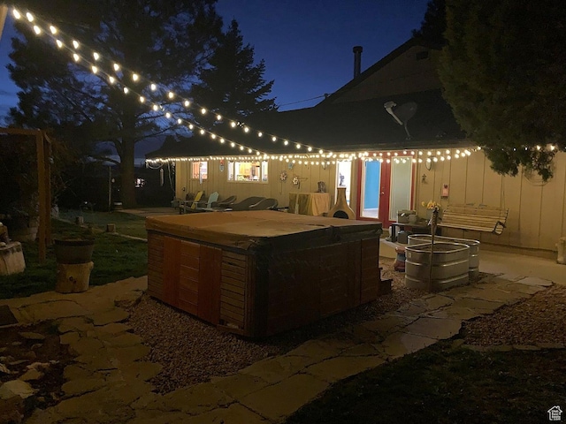 263 W 300 S, Parowan, UT 84761 - patio at night featuring a hot tub
