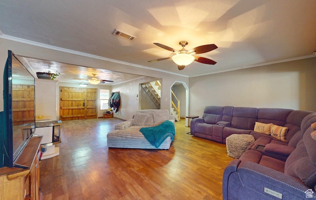 263 W 300 S, Parowan, UT 84761 - living room featuring crown molding, ceiling fan, stairs, wood finished floors, and visible vents