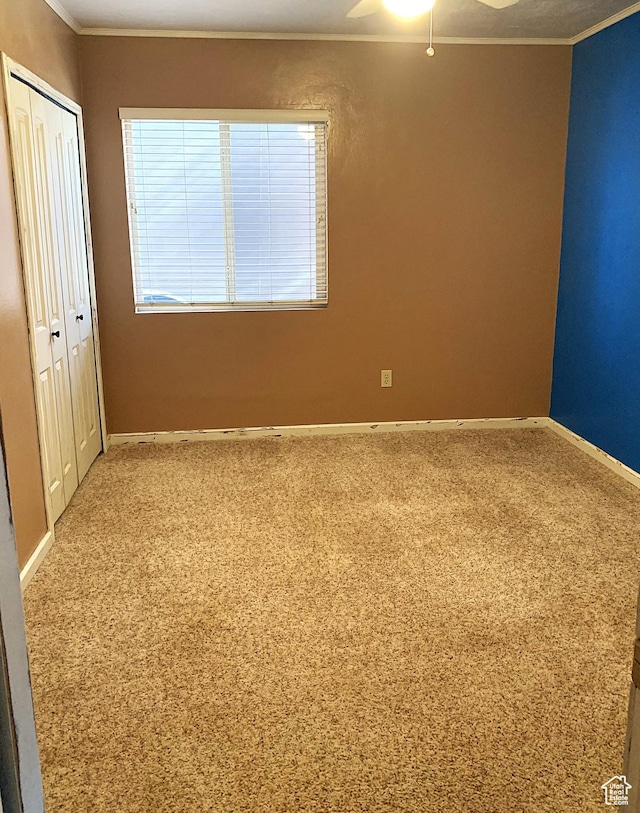 263 W 300 S, Parowan, UT 84761 - unfurnished bedroom featuring ceiling fan, carpet floors, baseboards, ornamental molding, and a closet