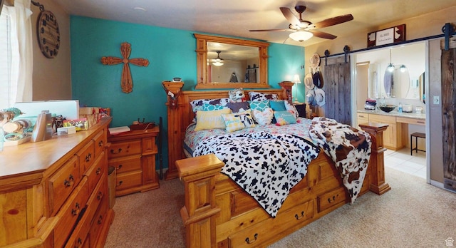 263 W 300 S, Parowan, UT 84761 - bedroom featuring a barn door, light colored carpet, and ceiling fan