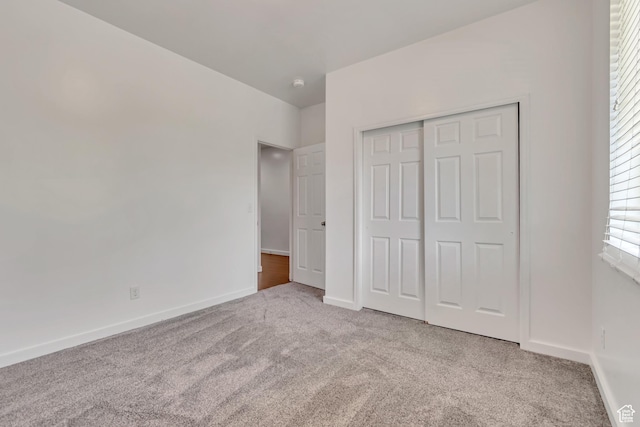 166 S 2035 W, Lehi, UT 84043 - unfurnished bedroom featuring carpet flooring, baseboards, and a closet