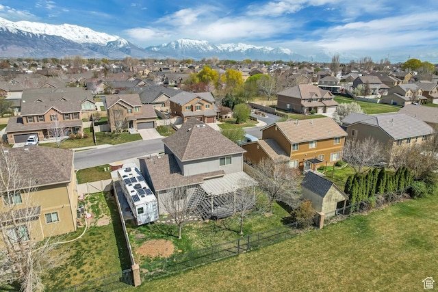 drone / aerial view with a mountain view and a residential view