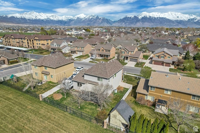 drone / aerial view with a mountain view and a residential view