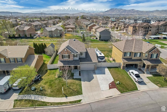 aerial view with a mountain view and a residential view