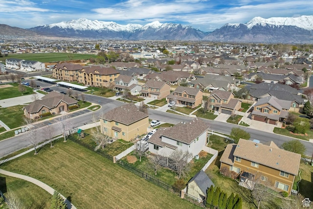 aerial view featuring a mountain view and a residential view