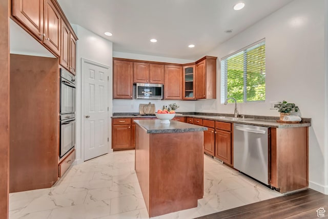 166 S 2035 W, Lehi, UT 84043 - kitchen featuring stainless steel appliances, a sink, light marble finish flooring, dark countertops, and recessed lighting