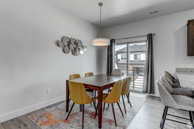 129 W Autumn Ln N, Saratoga Springs, UT 84045 - dining space featuring light wood finished floors and baseboards