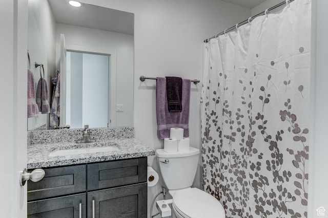 129 W Autumn Ln N, Saratoga Springs, UT 84045 - bathroom featuring toilet, vanity, and recessed lighting