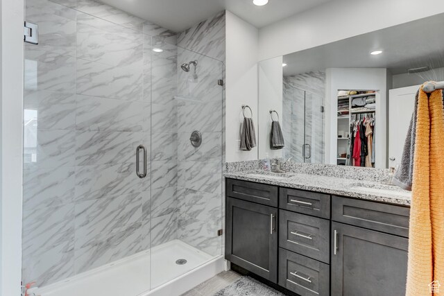 129 W Autumn Ln N, Saratoga Springs, UT 84045 - full bath featuring a shower stall, a spacious closet, double vanity, and recessed lighting