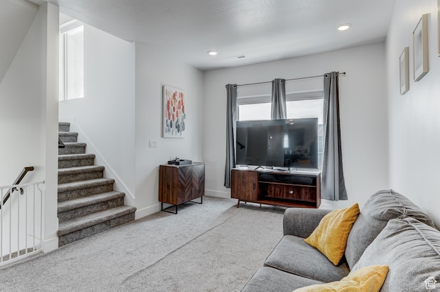 129 W Autumn Ln N, Saratoga Springs, UT 84045 - carpeted living area featuring stairs, baseboards, and recessed lighting